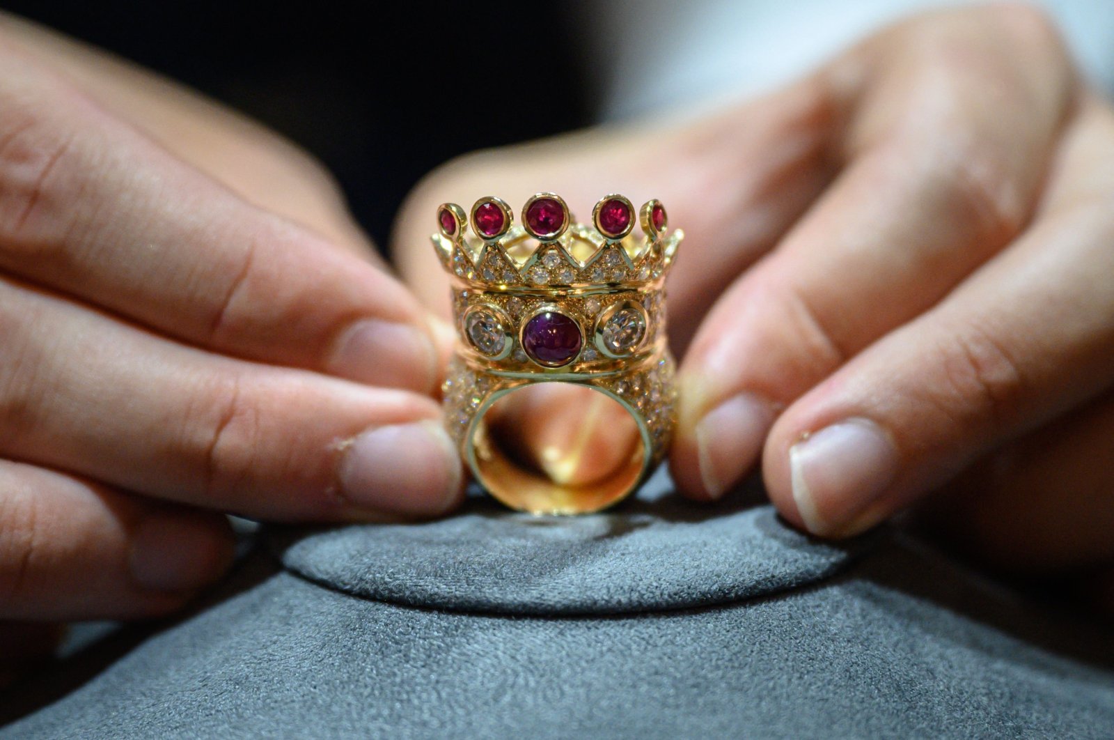 A gold, ruby, and diamond crown ring, designed and worn by the late U.S. rapper Tupac Shakur during his last public appearance in 1996, displayed during a press preview at Sotheby&#039;s in New York, U.S., July 20, 2023. (AFP Photo)
