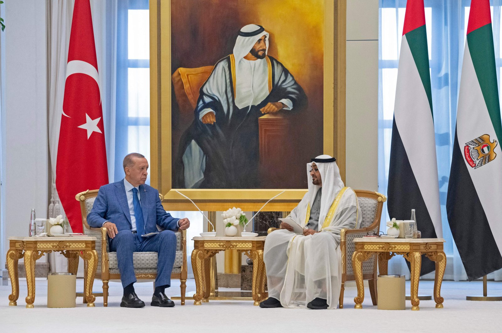 President Recep Tayyip Erdoğan (L) meets with United Arab Emirates President Sheikh Mohamed bin Zayed Al Nahyan in Abu Dhabi, UAE, July 18, 2023. (AFP Photo)
