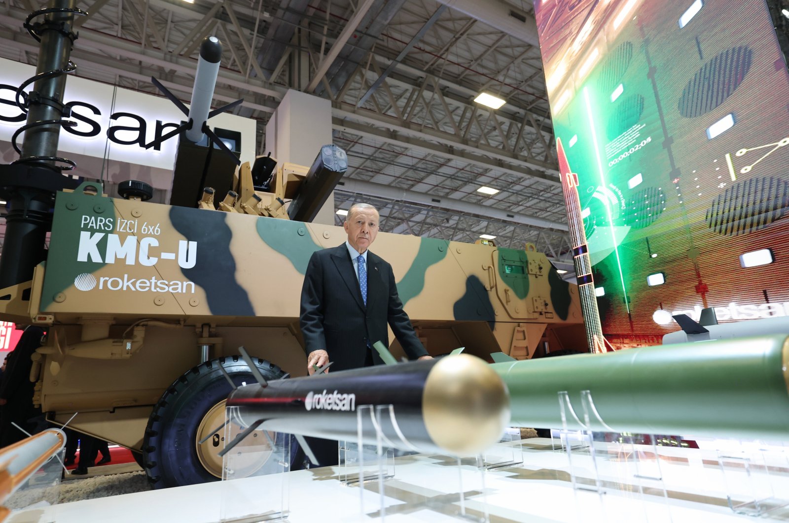President Recep Tayyip Erdoğan poses for a photo while examining the latest products at the IDEF defense fair, in Istanbul, Türkiye, July 28, 2023. (AA Photo)