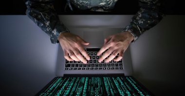 An American soldier in military uniform preventing a cyber attack at an unspecified location in this undated file photo. (Shutterstock File Photo)