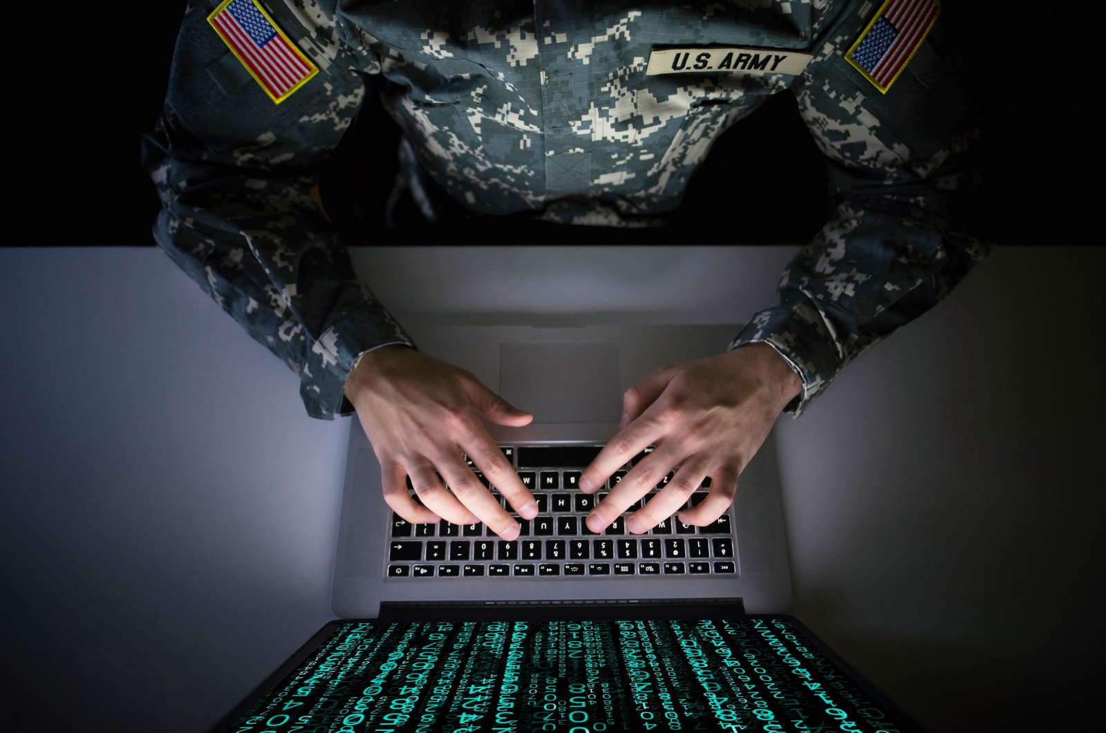 An American soldier in military uniform preventing a cyber attack at an unspecified location in this undated file photo. (Shutterstock File Photo)