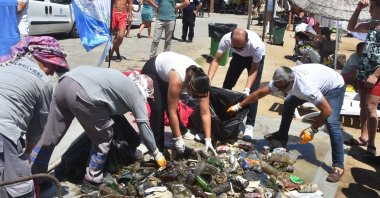 Volunteers collected garbage from beach in Muğla, Antalya, Türkiye, July 30, 2023. (DHA Photo)
