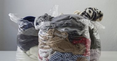 Clothes packed in plastic bags bought from a thrift store, Istanbul, Türkiye, July 30, 2023. (Getty Images)