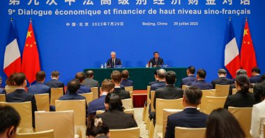 French Finance Minister Bruno Le Maire (C-L) speaks as Chinese Vice Premier He Lifeng (C-R) listens on a translation device during the 9th China-France High-Level Economic and Financial Dialogue at the Diaoyutai State Guest House in Beijing, China, July 29, 2023. (EPA Photo)