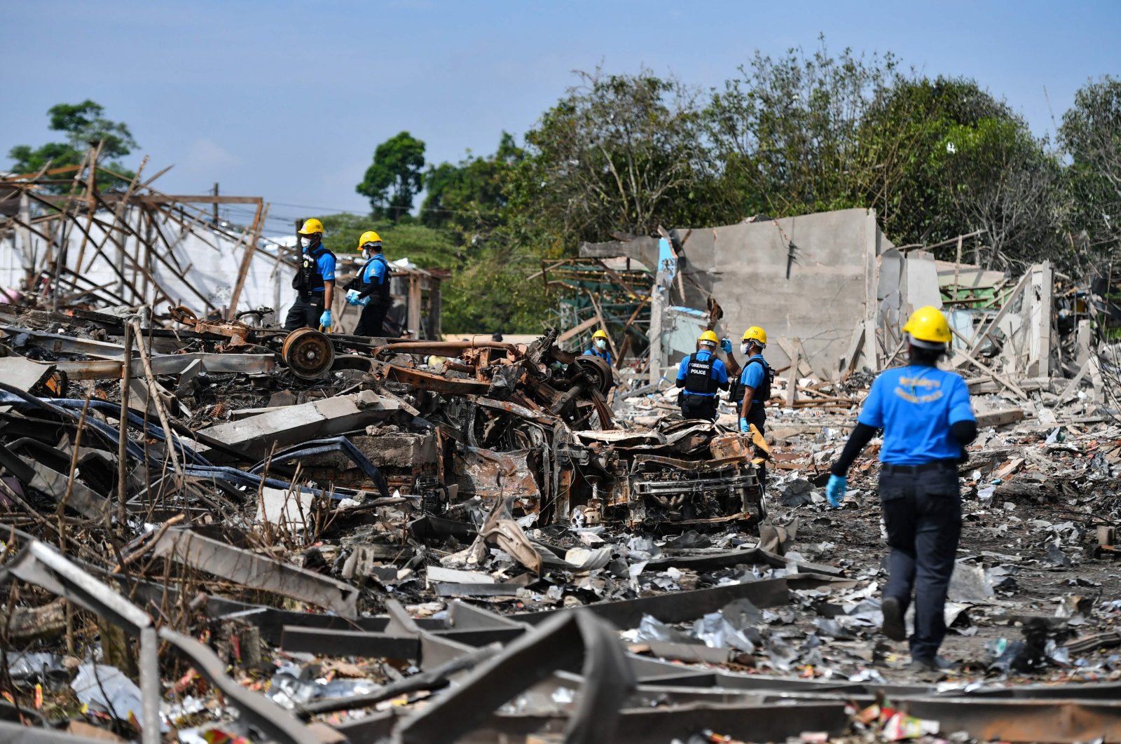 Forensic personnel inspect the site of the explosion in Sungai Kolok district Narathiwat province, Thailand, July 30, 2023. (AFP Photo)