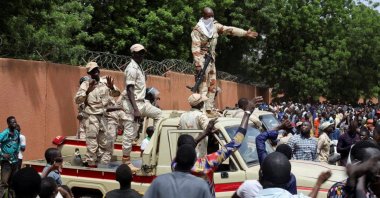 Nigerien security forces prepare to disperse pro-junta demonstrators gathered outside the French embassy, in Niamey, Niger, July 30, 2023. (Reuters Photo)