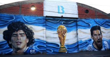 A mural of the late Diego Armando Maradona next to Lionel Messi is seen in Adrogue, Buenos Aires, Argentina, July 19, 2023. (Getty Images Photo)