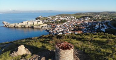 The view of Tenedos windmill, Çanakkale, Türkiye. (Shutterstock Photo)
