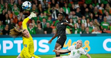 Nigeria's Asisat Oshoala of Nigeria (C) takes a shot on goal past Ireland's Courtney Brosnan during the FIFA Women's World Cup 2023 match at Brisbane Stadium, Brisbane, Australia, July 31, 2023. (EPA Photo)