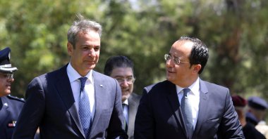Greek Cypriot President Nikos Christodoulides (R) and Greek Prime Minister Kyriakos Mitsotakis attend a welcoming ceremony, in Lefkoşa (Nicosia), Cyprus, July 31, 2023. (Reuters Photo)