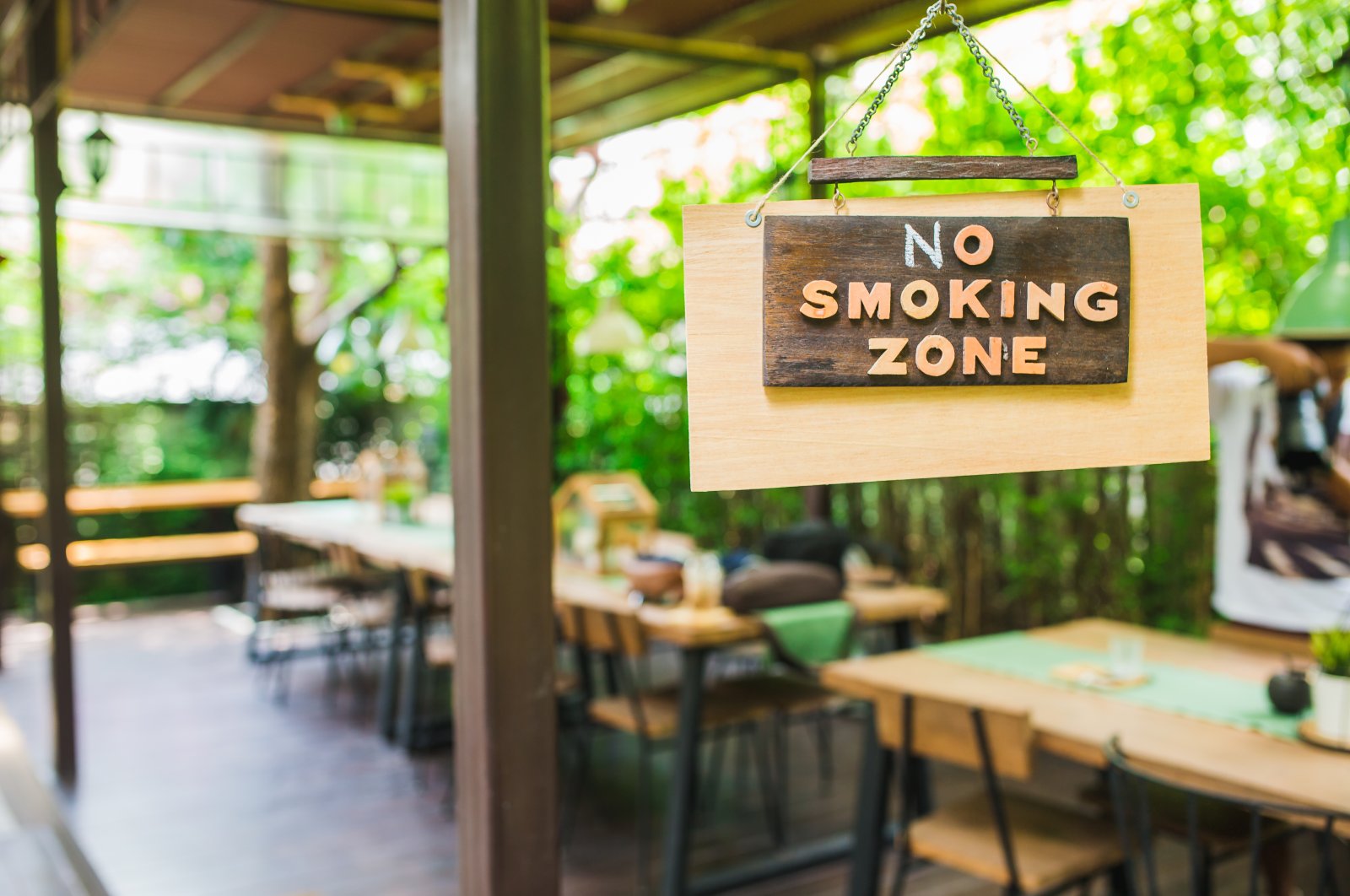 A &quot;No Smoking Zone&quot; sign is hung in an open-door meeting area, July 31, 2023. (Shutterstock Photo)