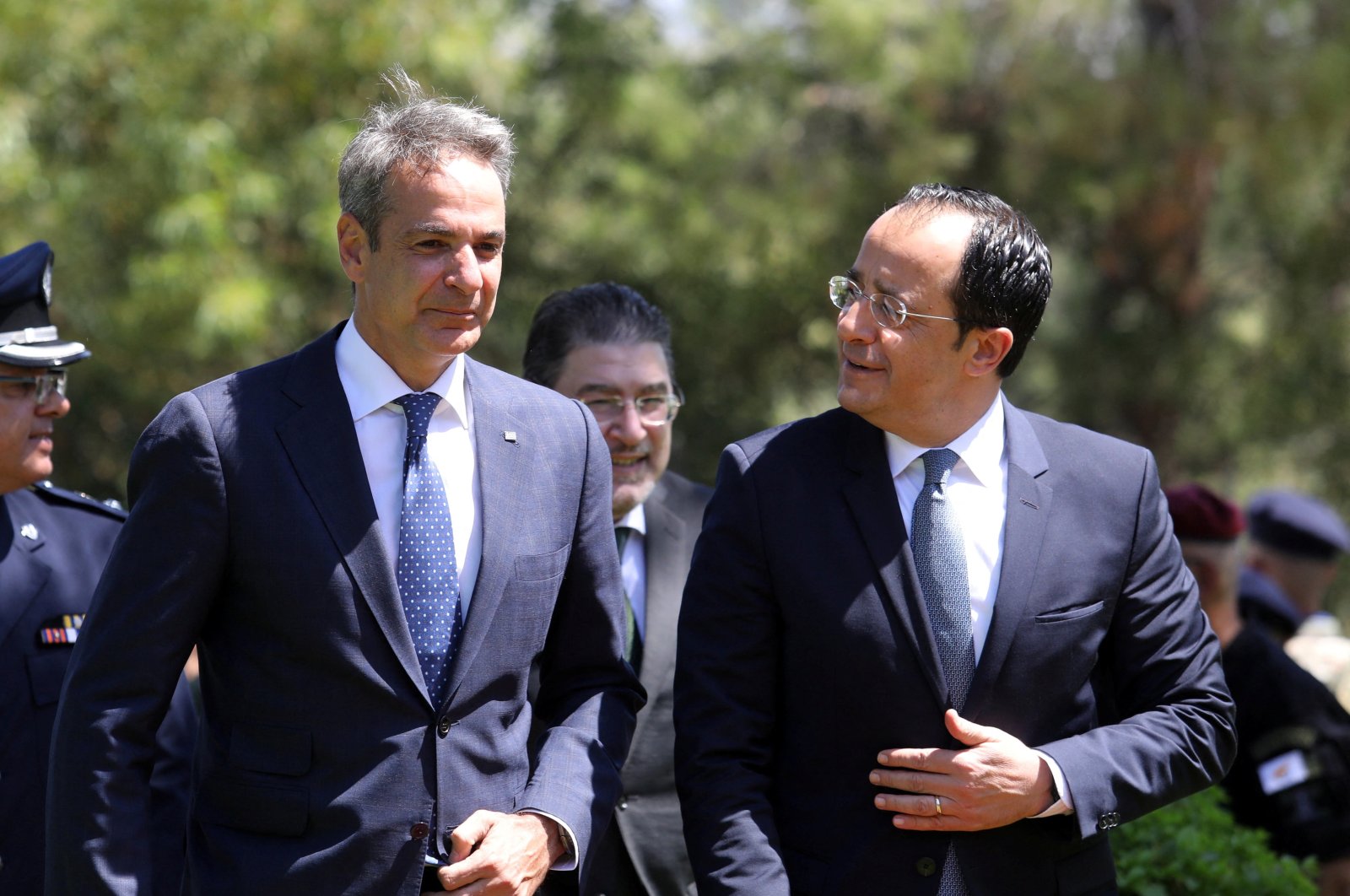 Greek Cypriot President Nikos Christodoulides (R) and Greek Prime Minister Kyriakos Mitsotakis attend a welcoming ceremony, in Lefkoşa (Nicosia), Cyprus, July 31, 2023. (Reuters Photo)