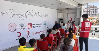 Children wait for eye screening in Muş, eastern Türkiye, Aug. 1, 2023. (AA Photo)