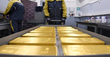 Marked ingots of 99.99% pure gold are placed in a cart at the Krastsvetmet non-ferrous metals plant in the Siberian city of Krasnoyarsk, Russia, March 10, 2022. (Reuters Photo)
