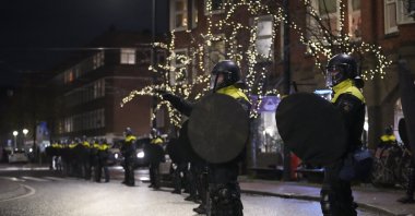 Dutch riot police break up a gathering of Morocco fans after fireworks were thrown when celebrating their team&#039;s victory against Spain in the World Cup round of 16 soccer match between Morocco and Spain, in Amsterdam, Netherlands, Tuesday, Dec. 6, 2022. (AP File Photo)