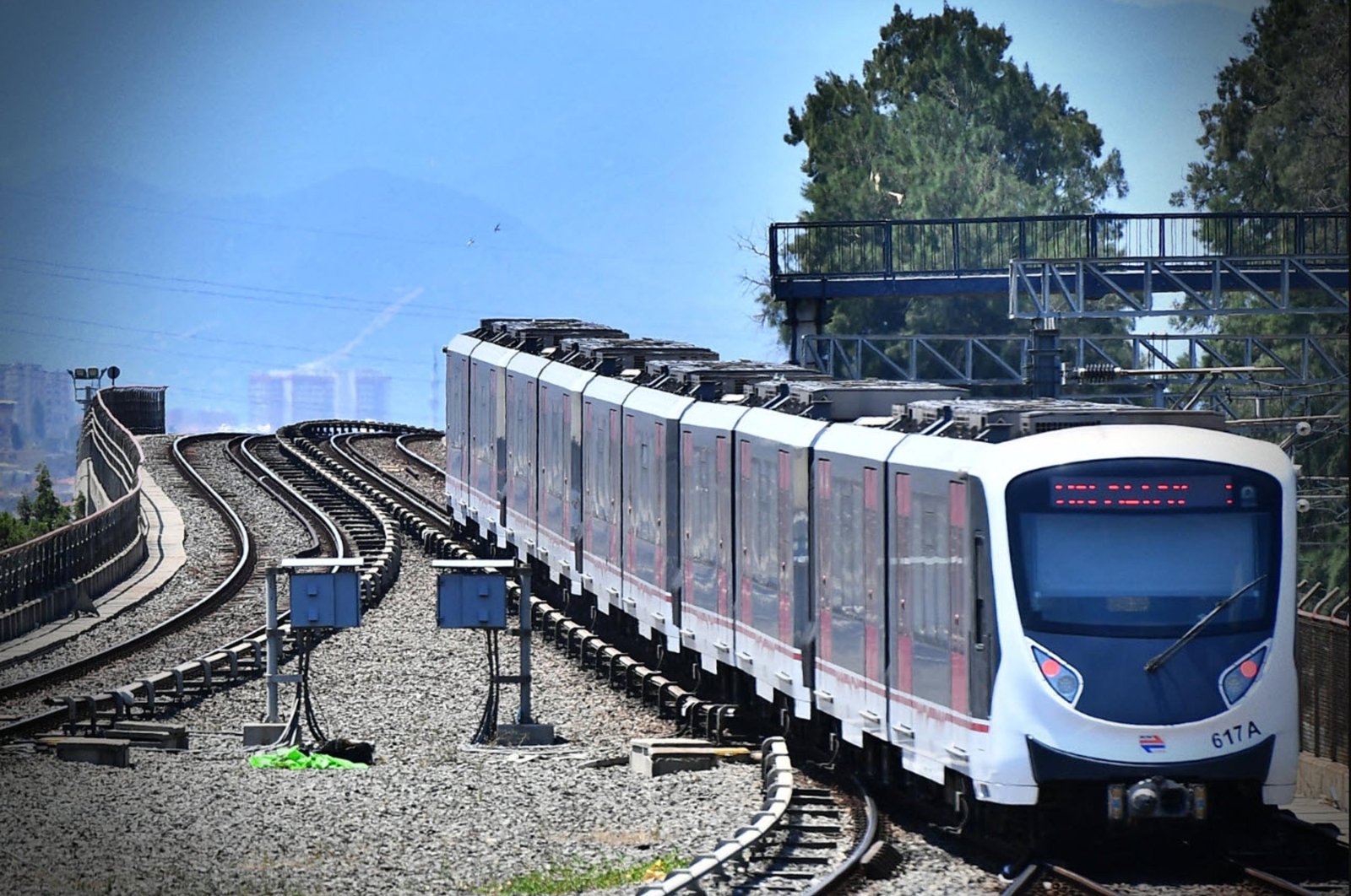 A tram is seen on the tracks in Izmir, Türkiye, Aug. 1, 2023. (DHA Photo)