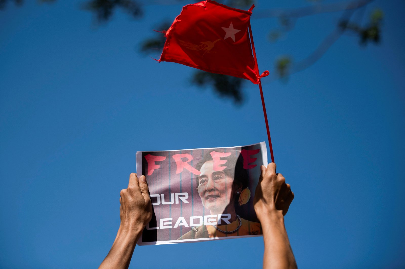 A demonstrator holds up a placard demanding the release of Aung San Suu Kyi, in Yangon, Myanmar, Feb. 11, 2021. (Reuters Photo)