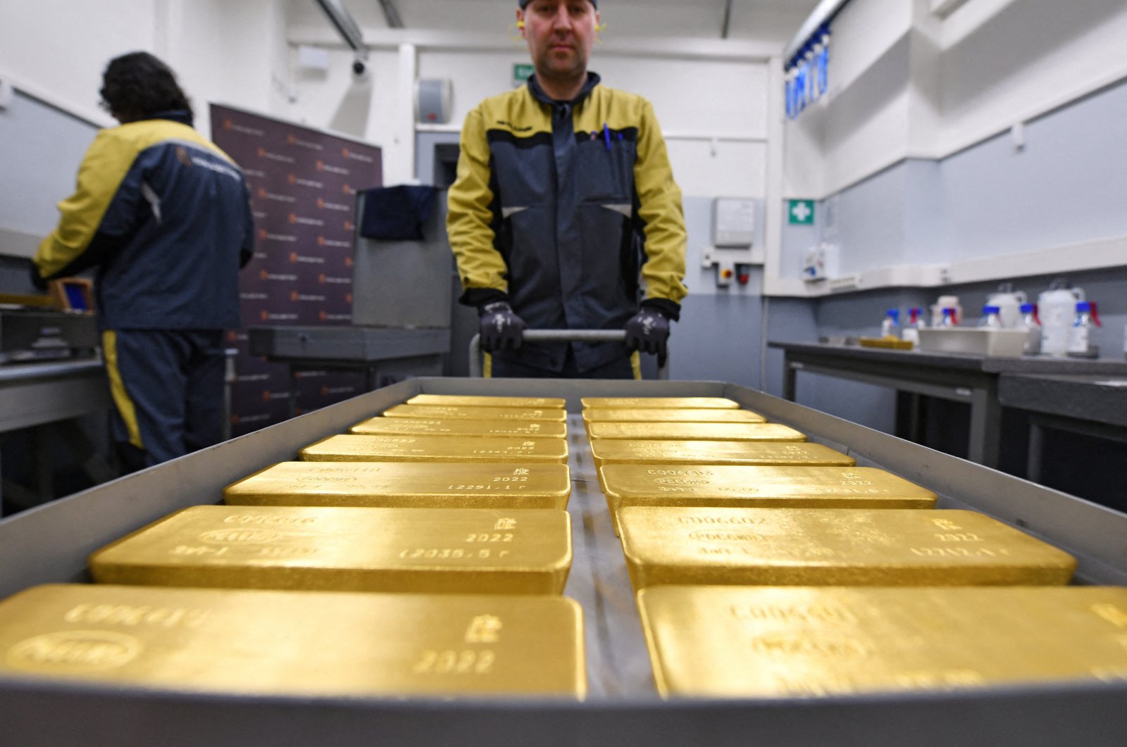 Marked ingots of 99.99% pure gold are placed in a cart at the Krastsvetmet non-ferrous metals plant in the Siberian city of Krasnoyarsk, Russia, March 10, 2022. (Reuters Photo)