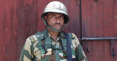 An Indian paramilitary soldier stands guard in Srinagar, the summer capital of Indian Kashmir, July 12, 2023. (EPA Photo)