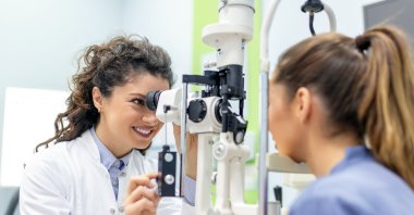 An ophthalmologist during an eye examination in a clinic at an unidentified location in this undated file photo. (Shutterstock File Photo)