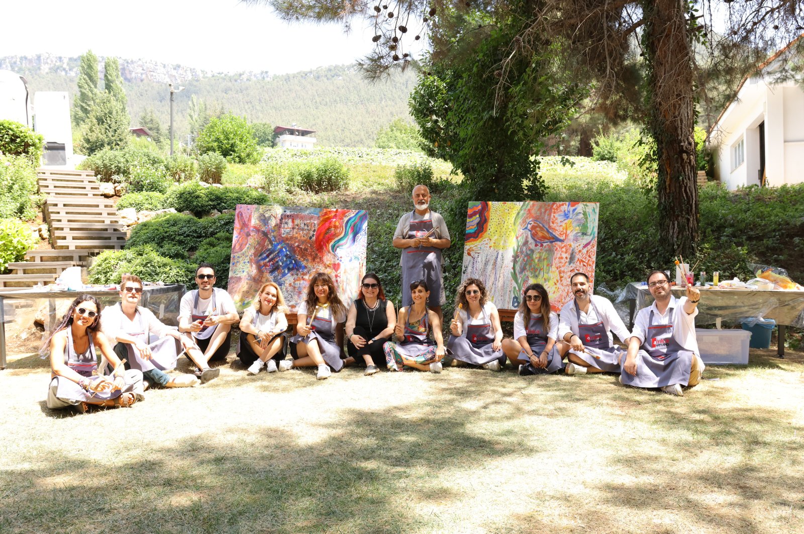 The press team poses with Arnica Art Land&#039;s Artistic director and curator, the artist Denizhan Özer, Mersin, Türkiye, July 29, 2023. (Photo courtesy of Arnica Art Land)