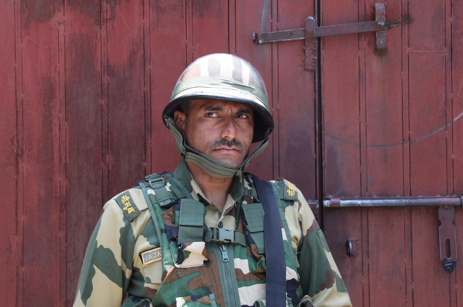 An Indian paramilitary soldier stands guard in Srinagar, the summer capital of Indian Kashmir, July 12, 2023. (EPA Photo)
