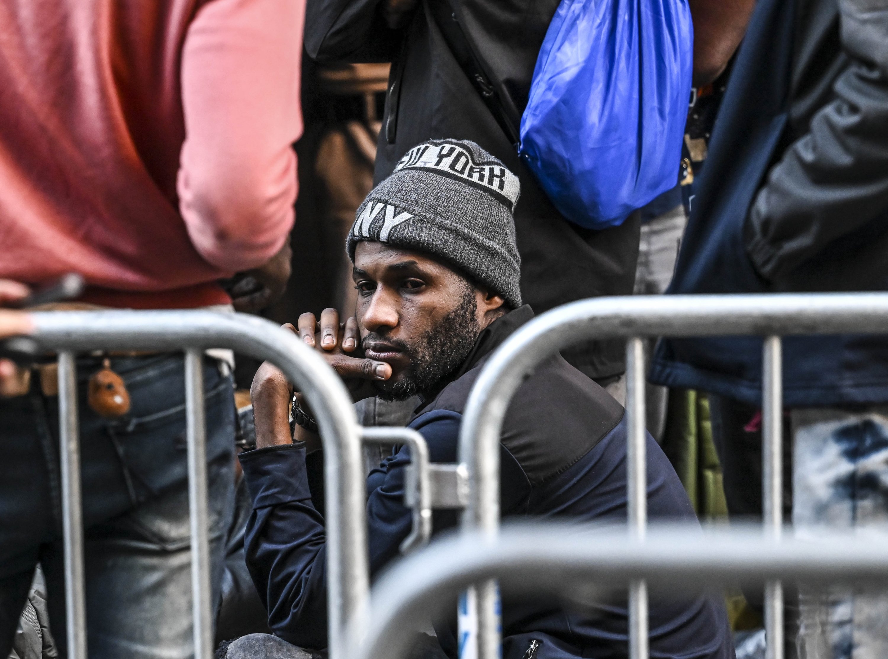 A migrant waits outside of the former Roosevelt Hotel in New York, New York, U.S., Aug. 2, 2023. (AA Photo)