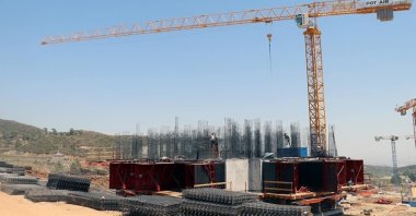 Construction workers install steel rods in a housing unit being built in quake-hit Hatay, Türkiye, Aug. 2, 2023. (AA Photo)