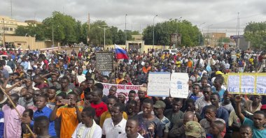 Supporters of Niger's ruling junta, gather for a protest called to fight for the country's freedom and push back against foreign interference, in Niamey, Niger, Thursday, Aug. 3, 2023. (AP Photo)