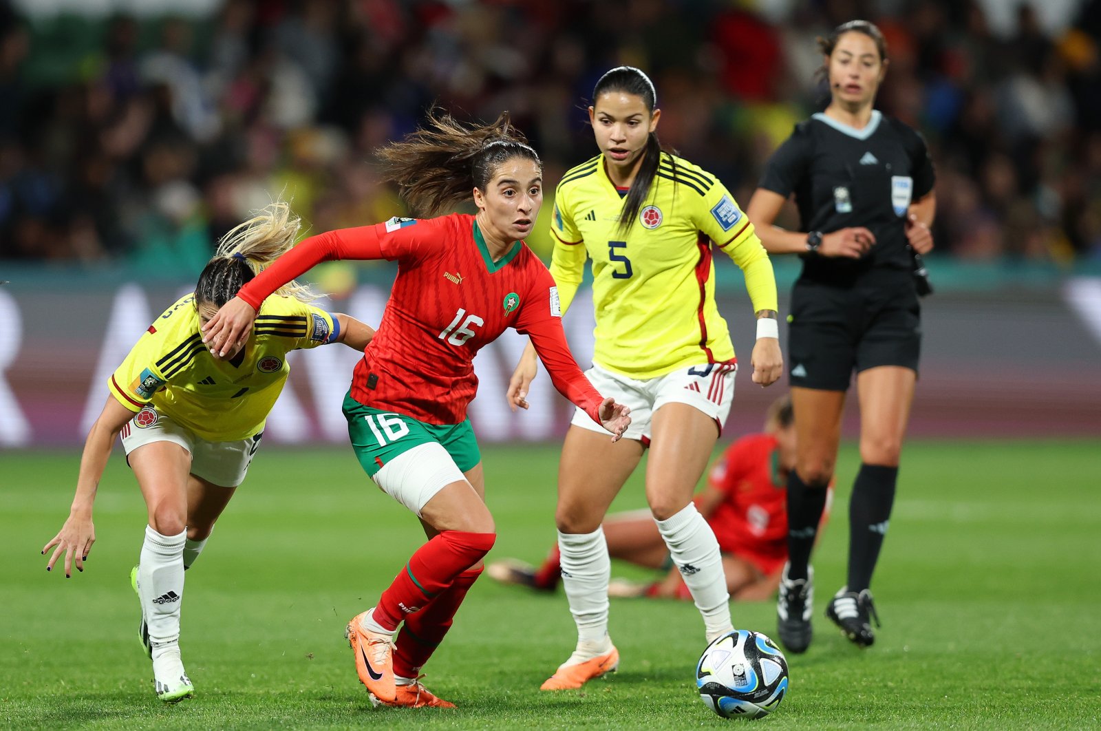 Morocco&#039;s Anissa Lahmari (2nd L) competes for the ball against Colombia&#039;s Lorena Bedoya Durango during the FIFA Women&#039;s World Cup Australia & New Zealand 2023 Group H match at Perth Rectangular Stadium, Perth, Australia, Aug. 03, 2023. (Getty Images Photo)