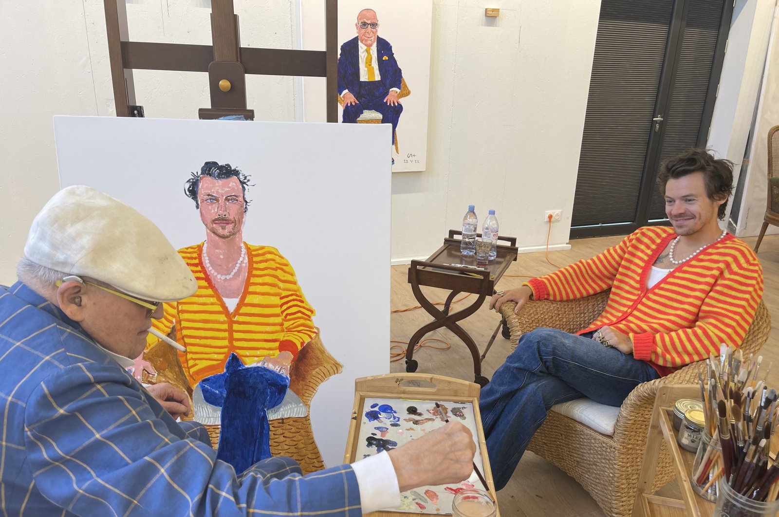 Undated handout photo issued by David Hockney of himself painting a portrait of Harry Styles which will go on display as part of &quot;David Hockney: Drawing from Life,&quot; which opens on Nov. 2 at the National Portrait Gallery in London, U.K., Aug. 2, 2023. (dpa Photo)