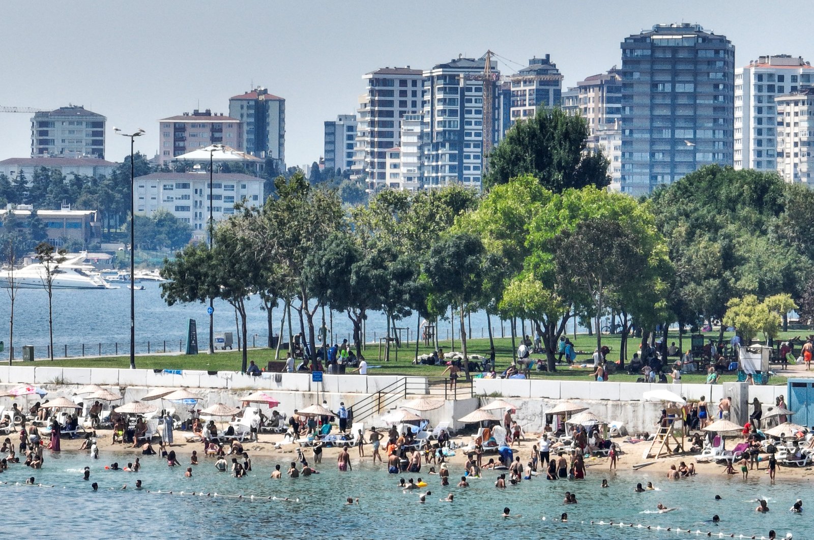 People swimming on the beach in Istanbul, Türkiye, Aug. 3, 2023. (AA Photo)