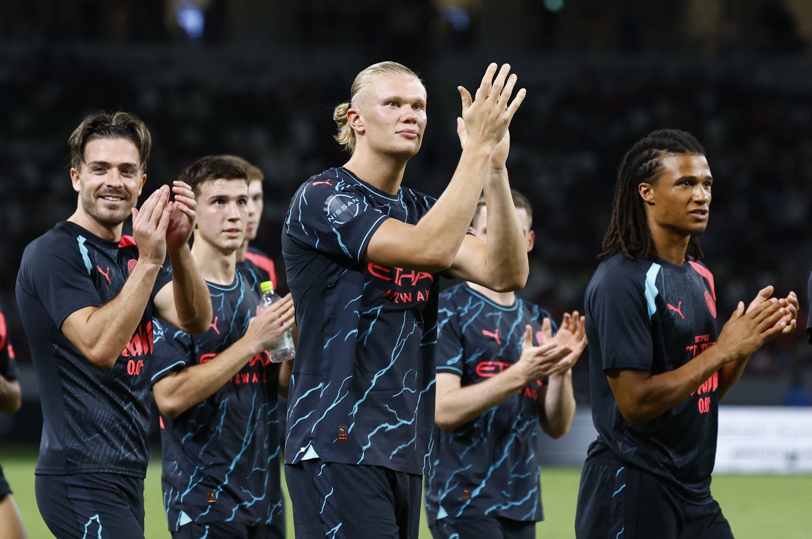 Manchester City players applaud fans after a friendly against Bayern Munich in Tokyo, Japan, July 26, 2023. (Reuters Photo)