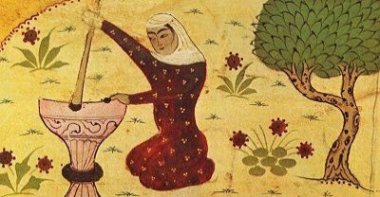 Depiction of Rabia grinding grain from a Persian dictionary. (Wikipedia Photo)