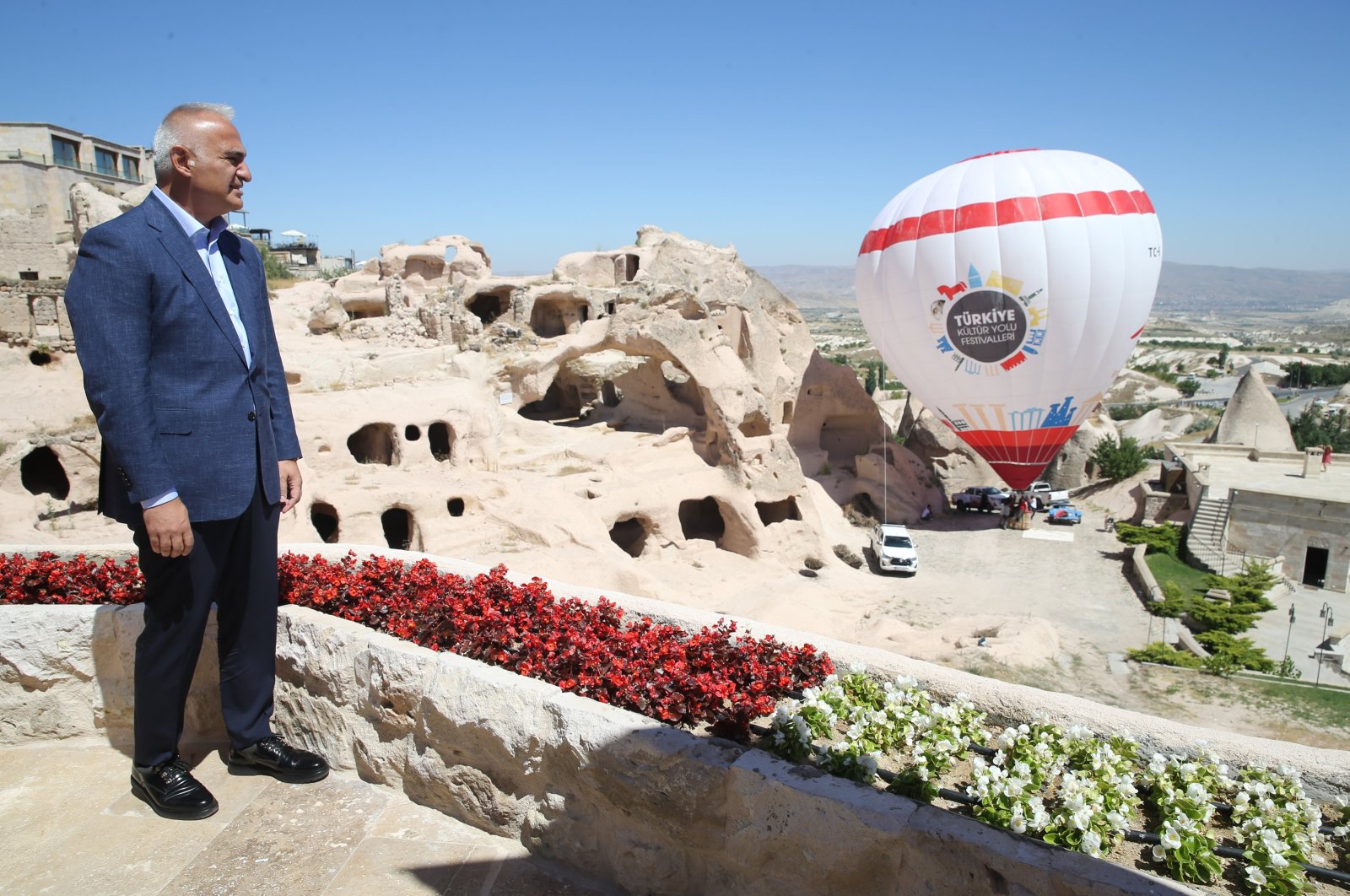 Culture and Tourism Minister Mehmet Nuri Ersoy gives statements to journalists as part of the Cappadocia Balloon and Culture Road Festival, Cappadocia region, Türkiye, Aug. 5, 2023. (AA Photo)