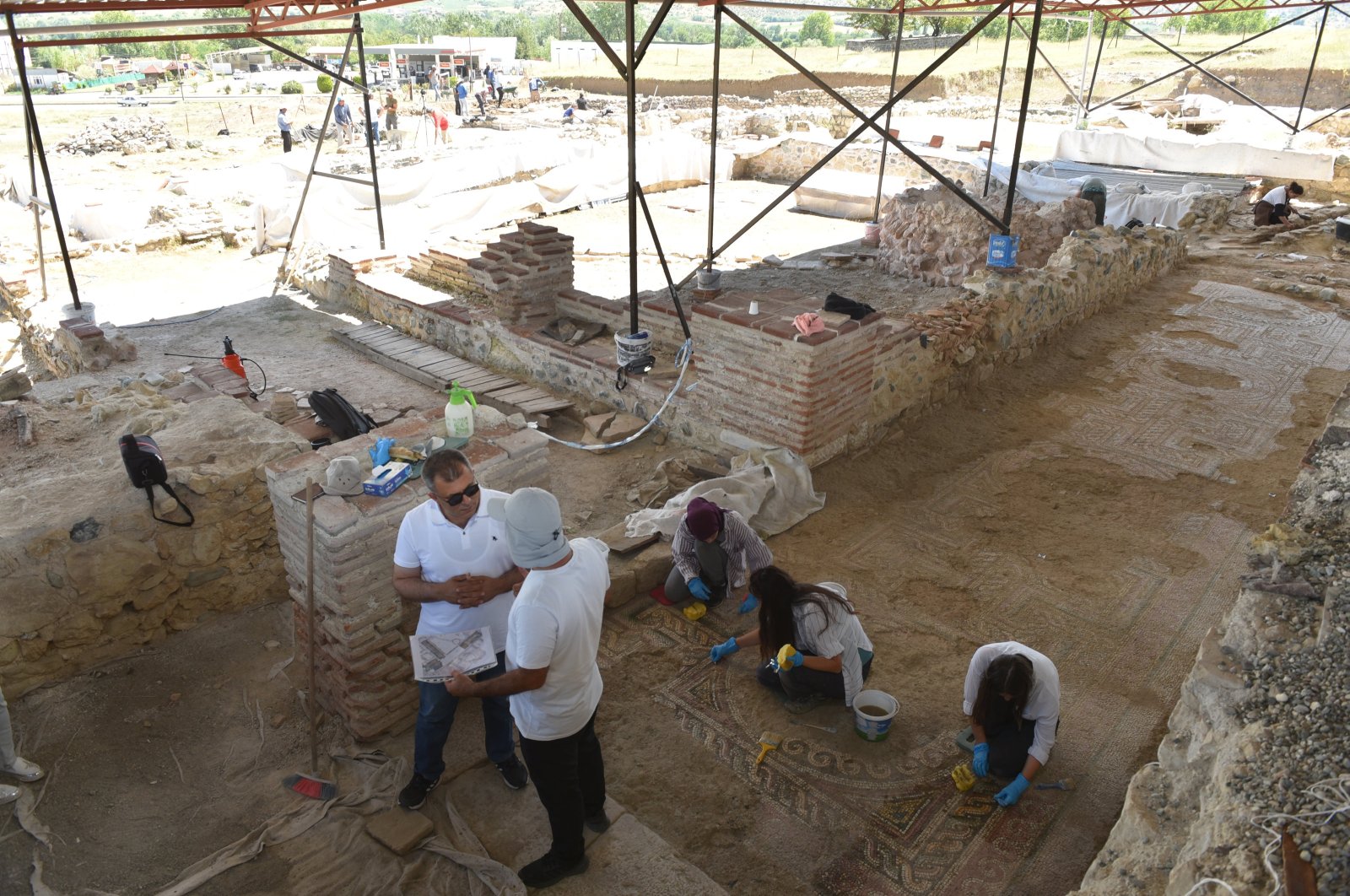 The excavation team is seen in the villa and theater structures in the ancient city of Pompeiopolis, Kastamonu, Türkiye, Aug. 6, 2023. (AA Photo)