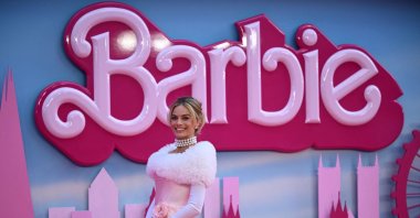 Australian actress Margot Robbie poses on the pink carpet upon arrival for the European premiere of &quot;Barbie&quot; in central London, U.K., July 12, 2023. (AFP Photo)