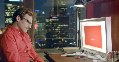 A still shot taken from the movie "Her" shows Joaquin Phoenix as Theodore Twombly, a man who develops a relationship with Samantha (Scarlett Johansson).