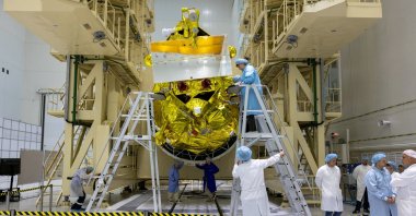 Specialists take part in preparations ahead of the launch of the lunar landing spacecraft Luna-25 mission to search for ice near the south pole of the moon, at the Vostochny Cosmodrome in the Amur region, Russia, in this handout photo published Aug. 1, 2023. (Reuters Photo)