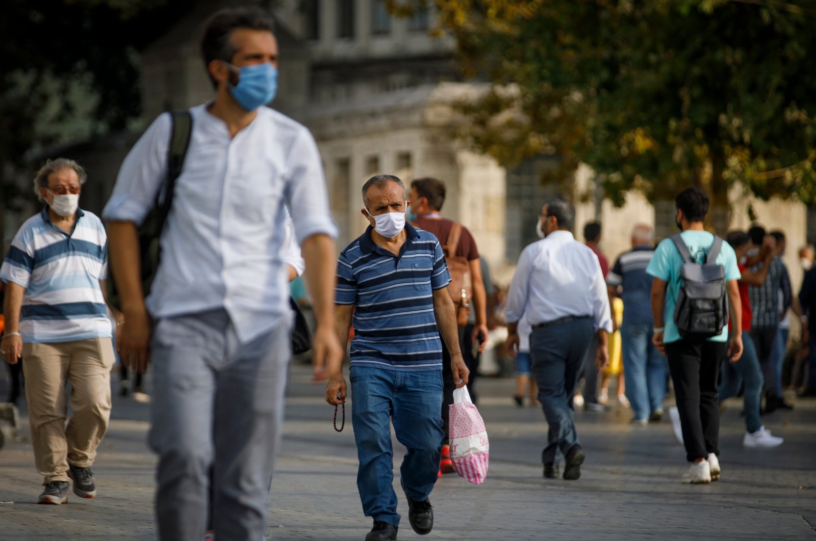 People wear protective face masks due to coronavirus concerns in Istanbul, Türkiye, Sep. 13, 2020. (Shutterstock Photo)