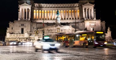 A taxi and a bus pass in front of Venice Square, Rome, Italy, Nov. 24, 2019. (Shutterstock File Photo)