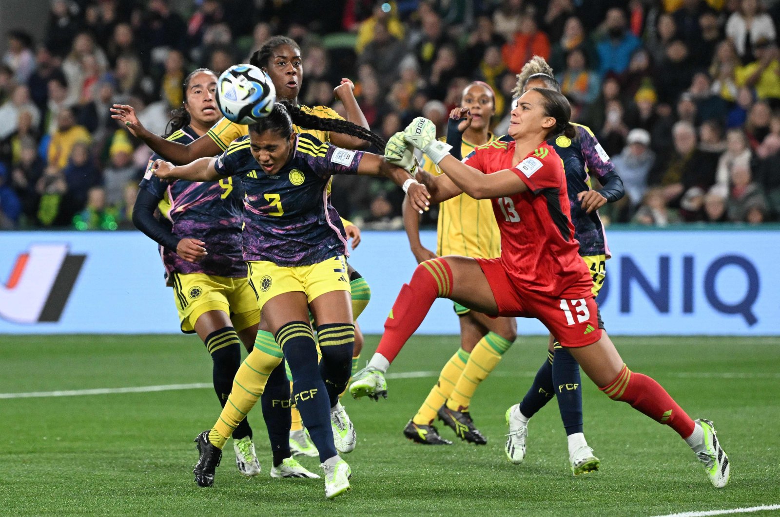 Jamaica&#039;s goalkeeper (R) Rebecca Spencer clears the ball past Colombia&#039;s defender Daniela Arias during the Women&#039;s World Cup round of 16 match at Melbourne Rectangular Stadium, Melbourne, Australia, Aug. 8, 2023. (AFP Photo)