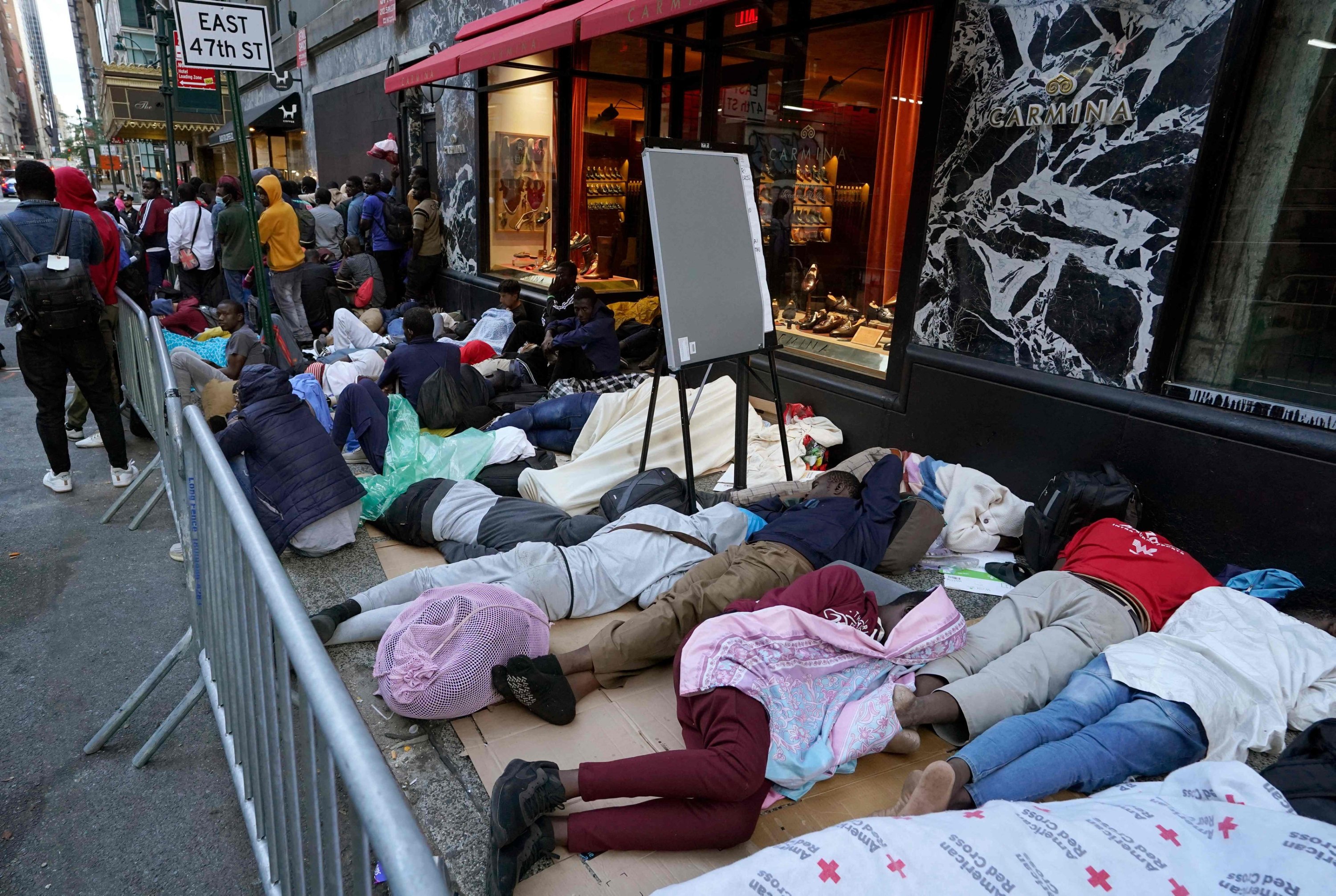 Migrants sleep on the street in New York,  Aug.1, 2023. (AFP Photo)