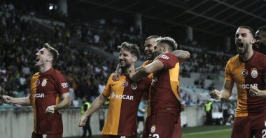 Galatasaray players celebrate after scoring against Olimpija Ljubljana during the UEFA Champions League qualifiers 3rd round match, Ljubljana, Slovenia, Aug. 8, 2023. (AA Photo)