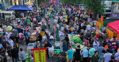 People visit a market in Shenyang, in China&#039;s northeastern Liaoning province, Aug. 9, 2023. (AFP Photo)