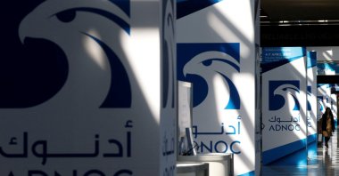 Logos of ADNOC at Gastech, the world's biggest expo for the gas industry, in Chiba, Japan, April 4, 2017. (Reuters Photo)