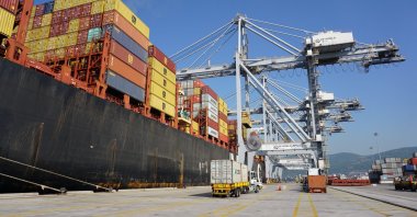 A ship and containers are seen at a port in Kocaeli, northwestern Türkiye, July 22, 2023. (IHA Photo)