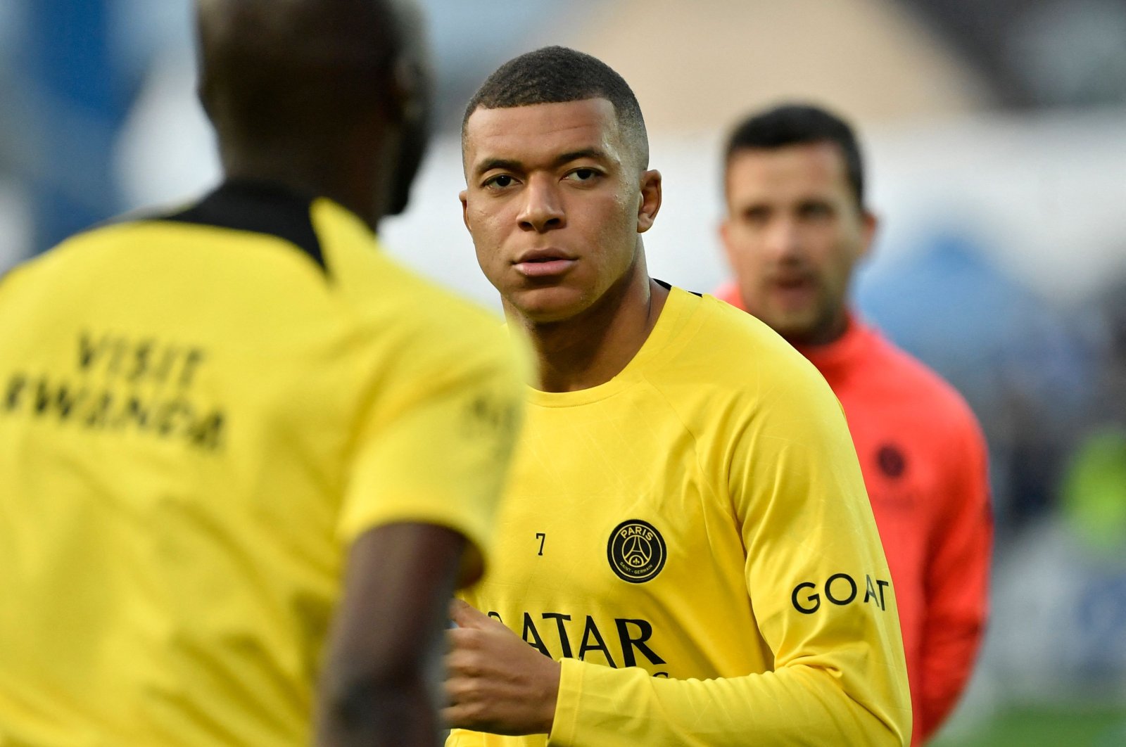 Paris Saint-Germain&#039;s French forward Kylian Mbappe looks on as he warms up before the French L1 football match between AJ Auxerre and PSG at Stade de l&#039;Abbe-Deschamps, Auxerre, France, May 21, 2023. (AFP Photo)