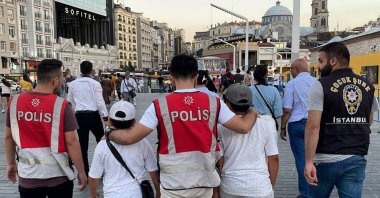 Children who were found begging and peddling around Taksim Square and Istiklal Street are seen taken into custody, Istanbul, Türkiye, Aug. 10, 2023. (AA Photo)