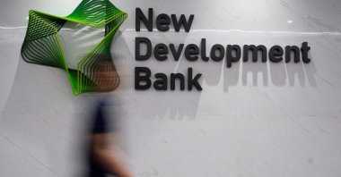 A view of the logo of the New Development Bank (NDB) at its headquarters in Shanghai, China, July 10, 2023. (Reuters Photo)